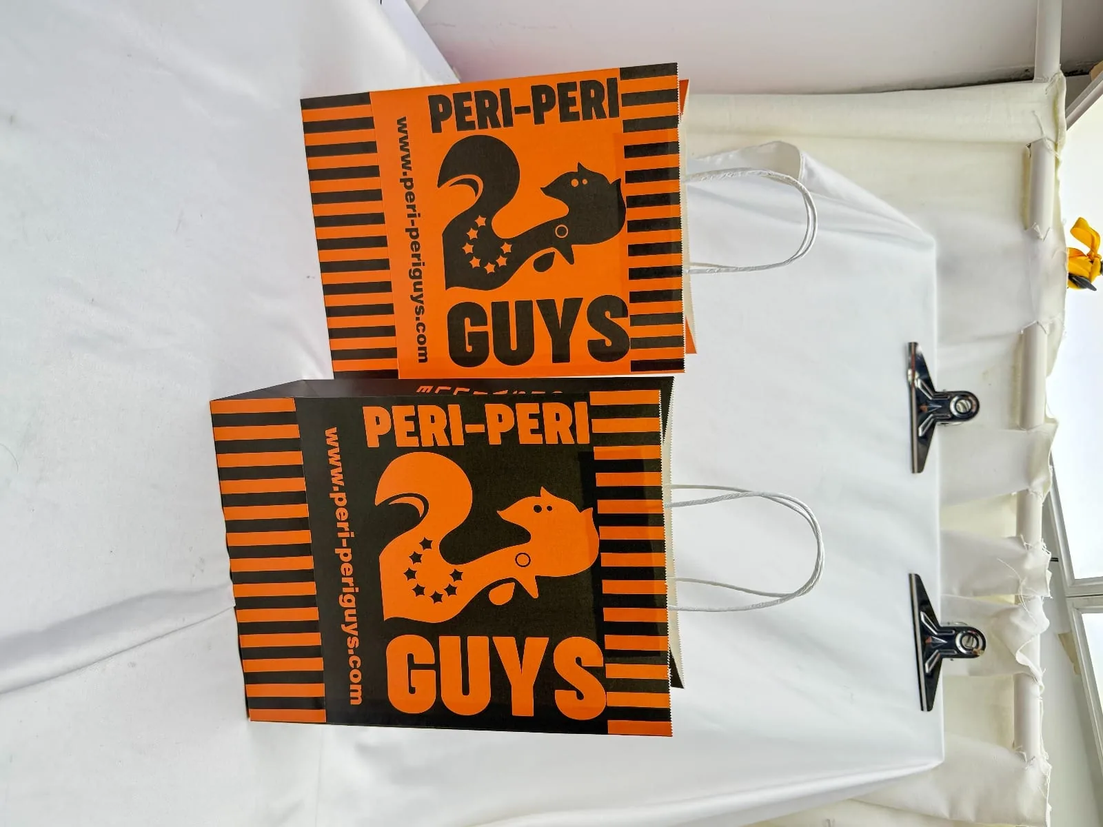 Peri-Peri Guys branded takeaway packaging